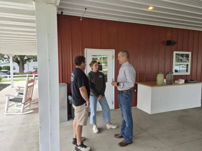 Naig talks market, water quality